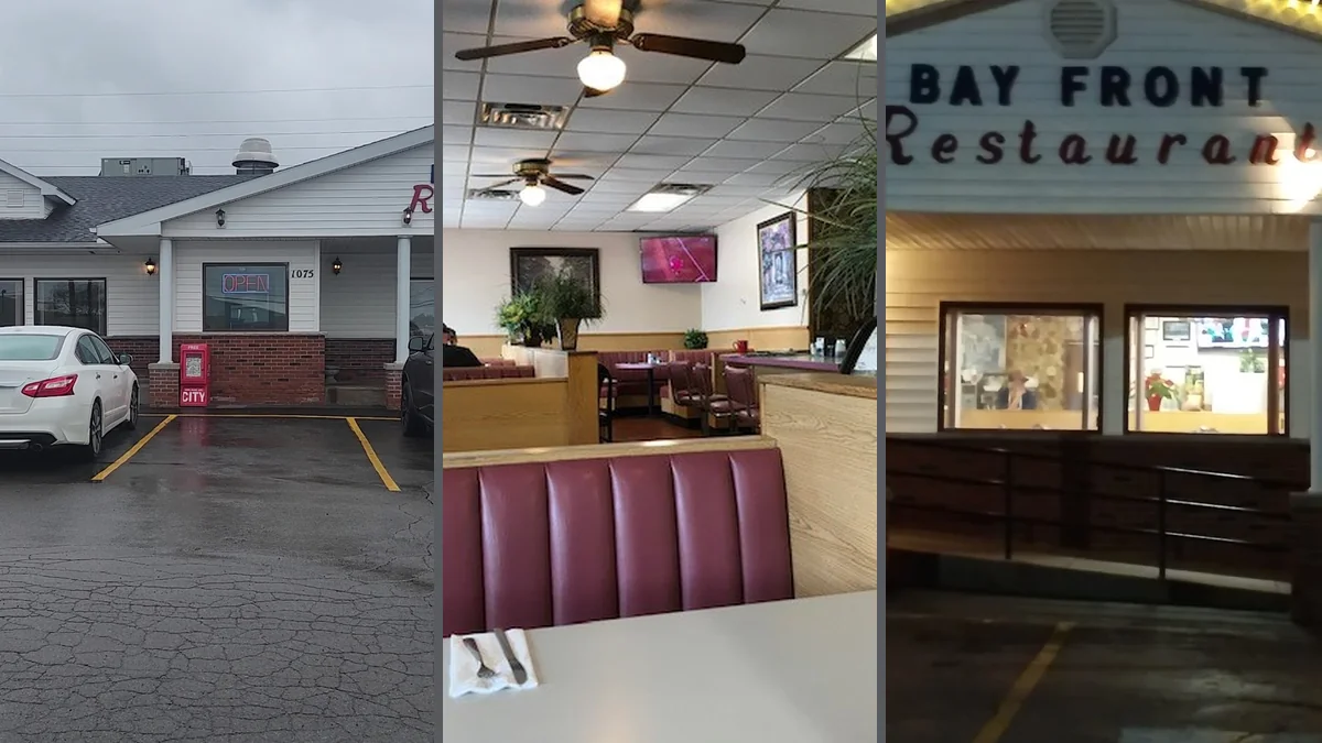 Clean dining area with booths and place settings.